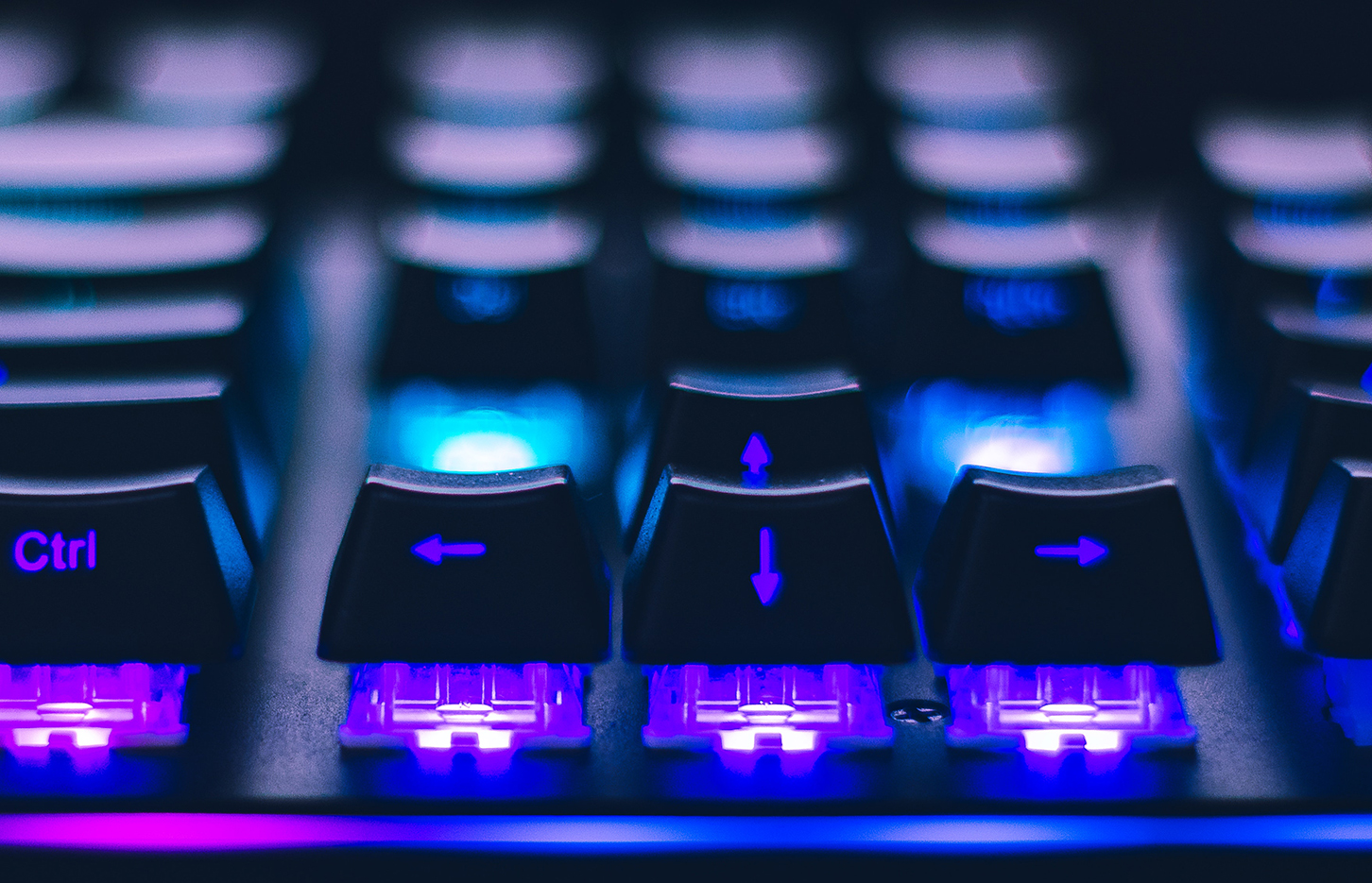 Close-up of arrow keys at a gaming keyboard