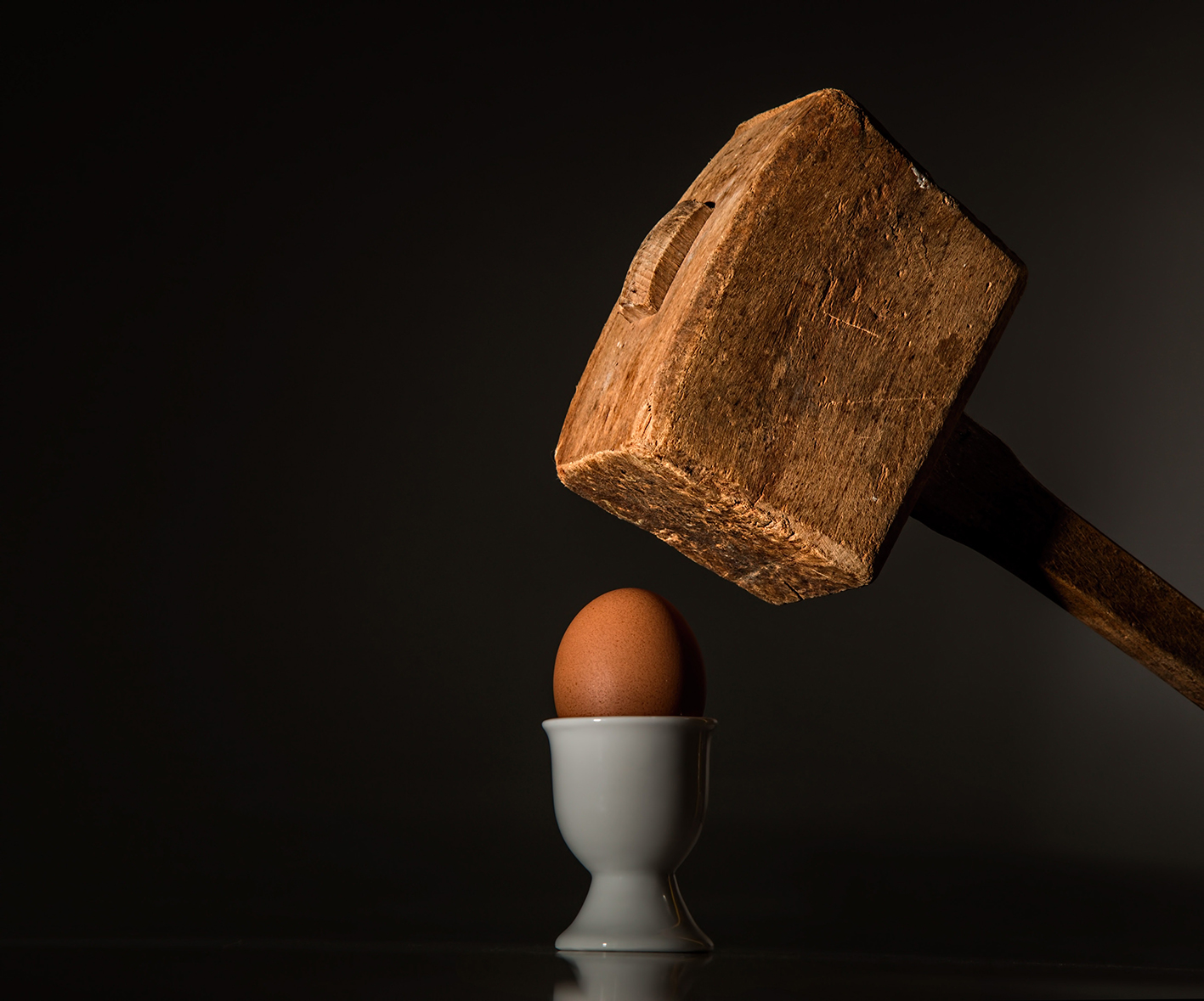 sledgehammer above cooked egg
